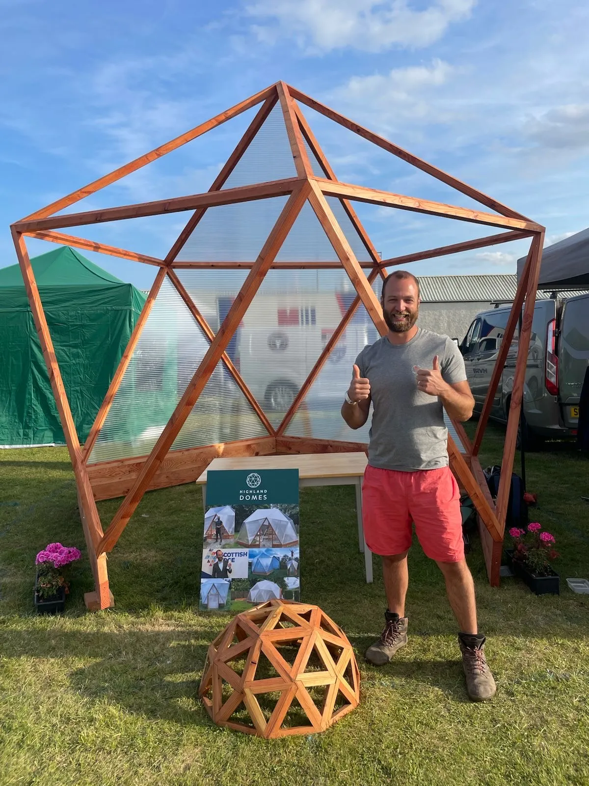 Stefan Quarry handcrafting a Highland Domes geodesic greenhouse frame from Douglas Fir timber